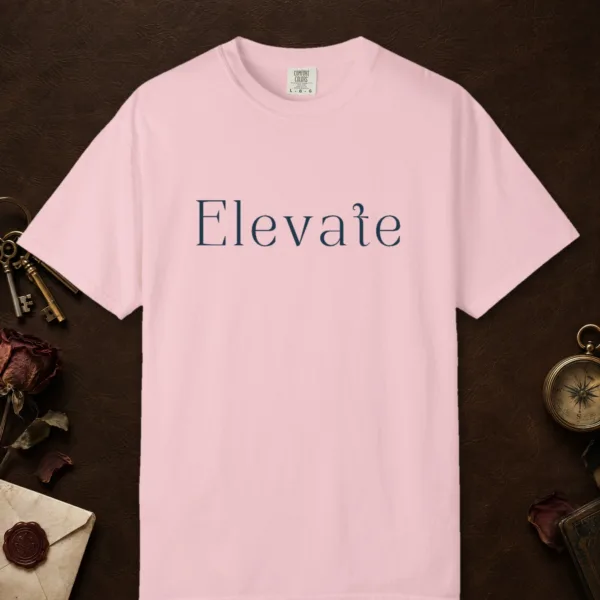 Elevate Serif design on a Blossom Comfort Colors 1717 tee, laid flat
