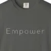Close-up of the Empower Light Line print on a Pepper Comfort Colors 1717 tee