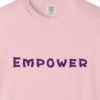 Close-up of the Empower print on a Blossom Comfort Colors 1717 tee