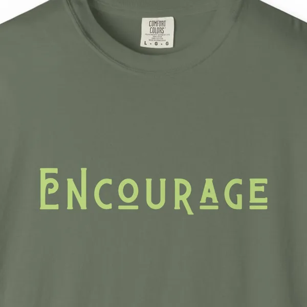 encourage-tee-moss-chest Close-up of the Encourage print on a Moss Comfort Colors 1717 tee