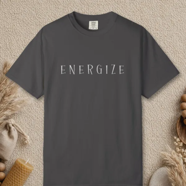 energize-flared-capitals-tee-graphite-front Energize Flared Capitals design on a Graphite Comfort Colors 1717 tee, laid flat