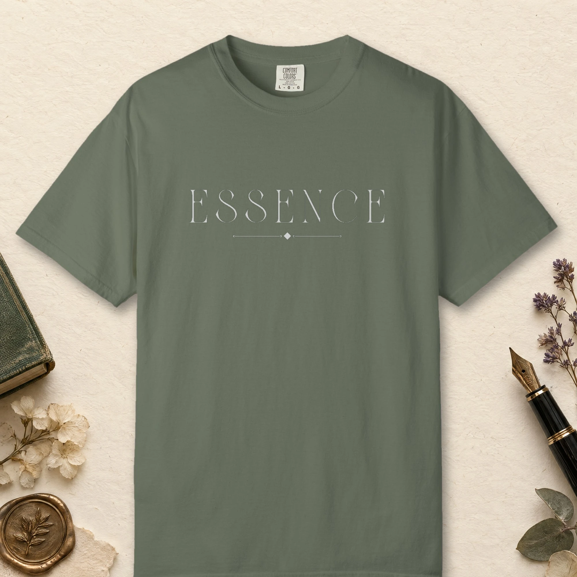 Essence Tall Serif design on a Moss Comfort Colors 1717 tee, laid flat