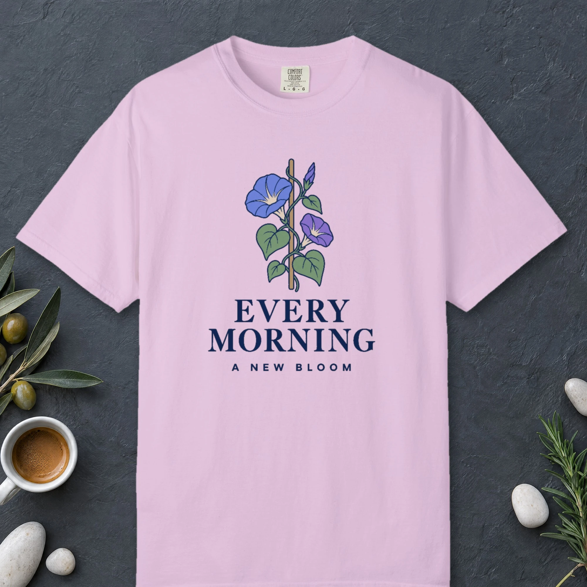 Every Morning a New Bloom design on a Orchid Comfort Colors 1717 tee, laid flat