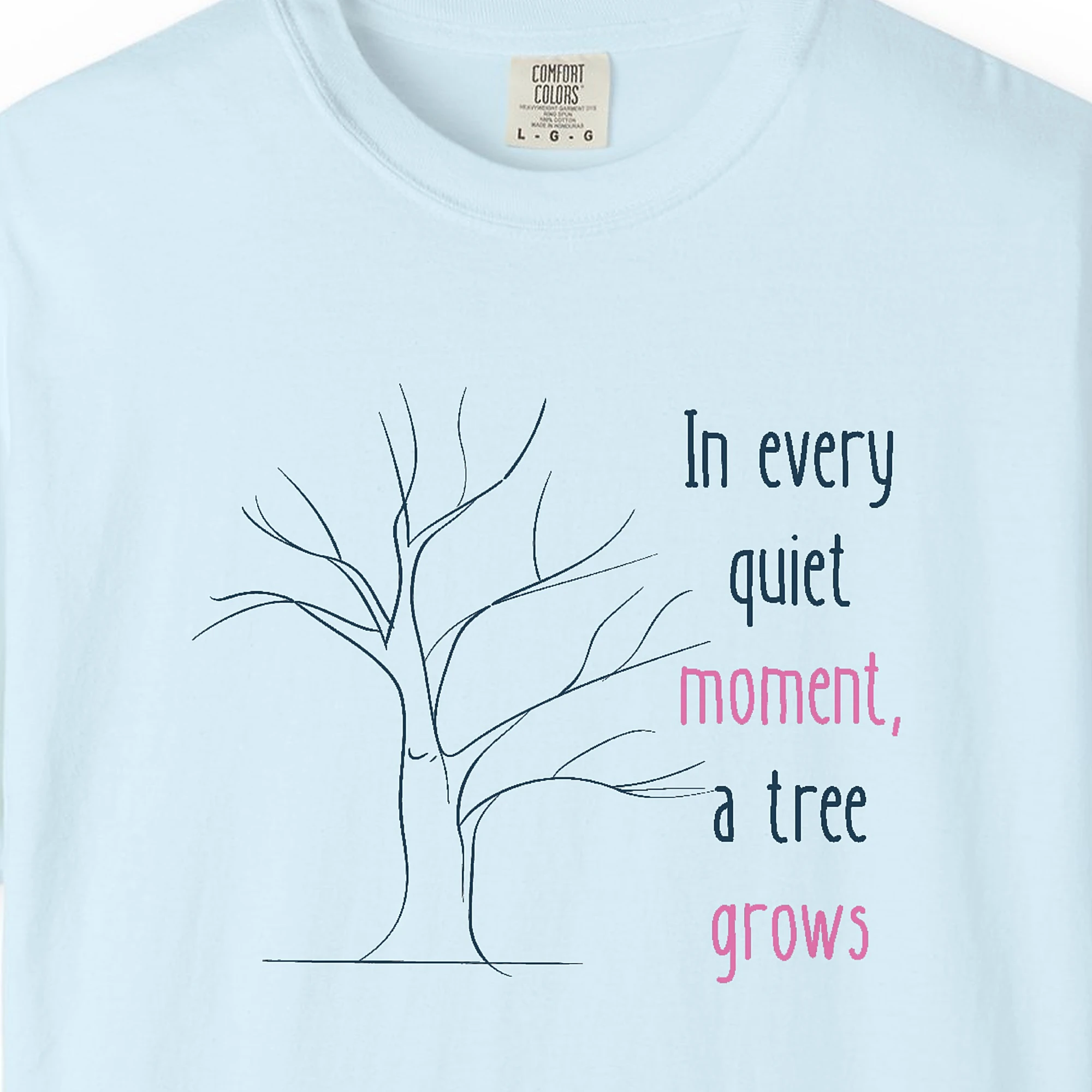 Close-up of the Every Quiet Moment print on a Chambray Comfort Colors 1717 tee