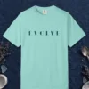 Evolve Art Deco design on a Chalky Mint Comfort Colors 1717 tee, laid flat