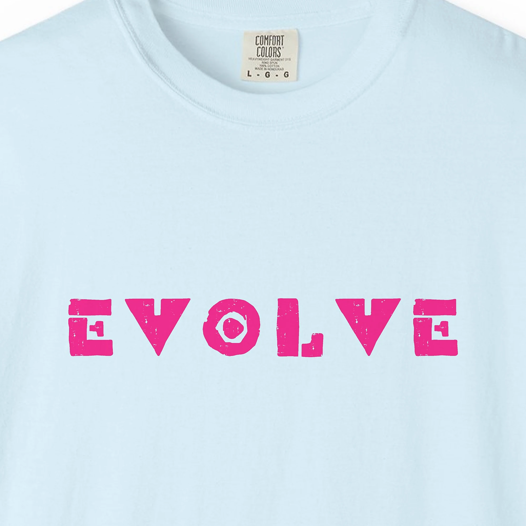 evolve-tee-chambray-chest Close-up of the Evolve print on a Chambray Comfort Colors 1717 tee