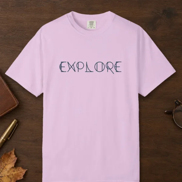 explore-tee-orchid-front Explore design on a Orchid Comfort Colors 1717 tee, laid flat