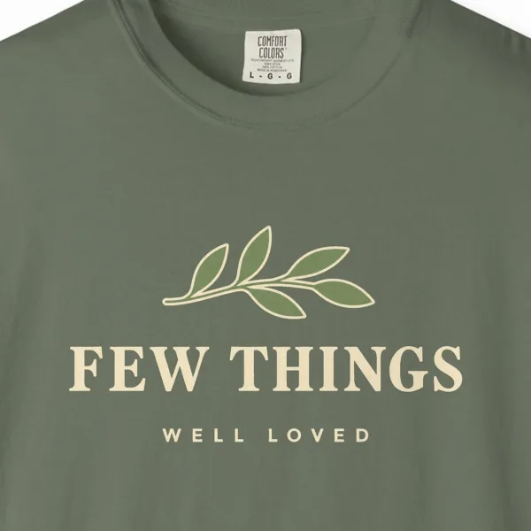 Close-up of the Few Things Well Loved print on a Moss Comfort Colors 1717 tee