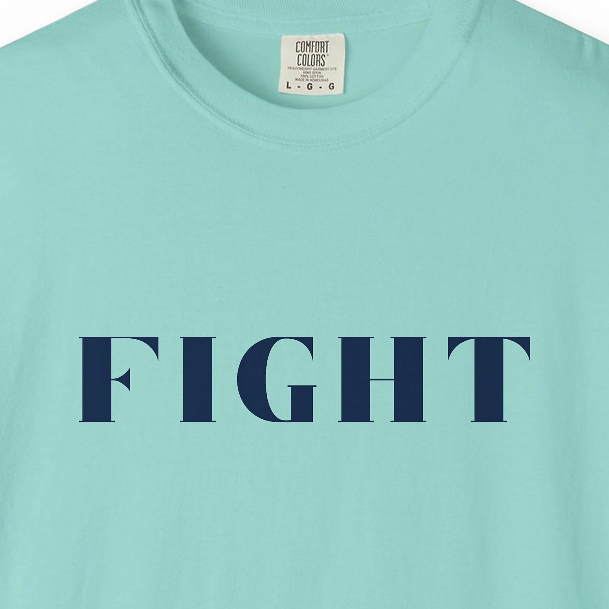 Close-up of the Fight print on a Chalky Mint Comfort Colors 1717 tee