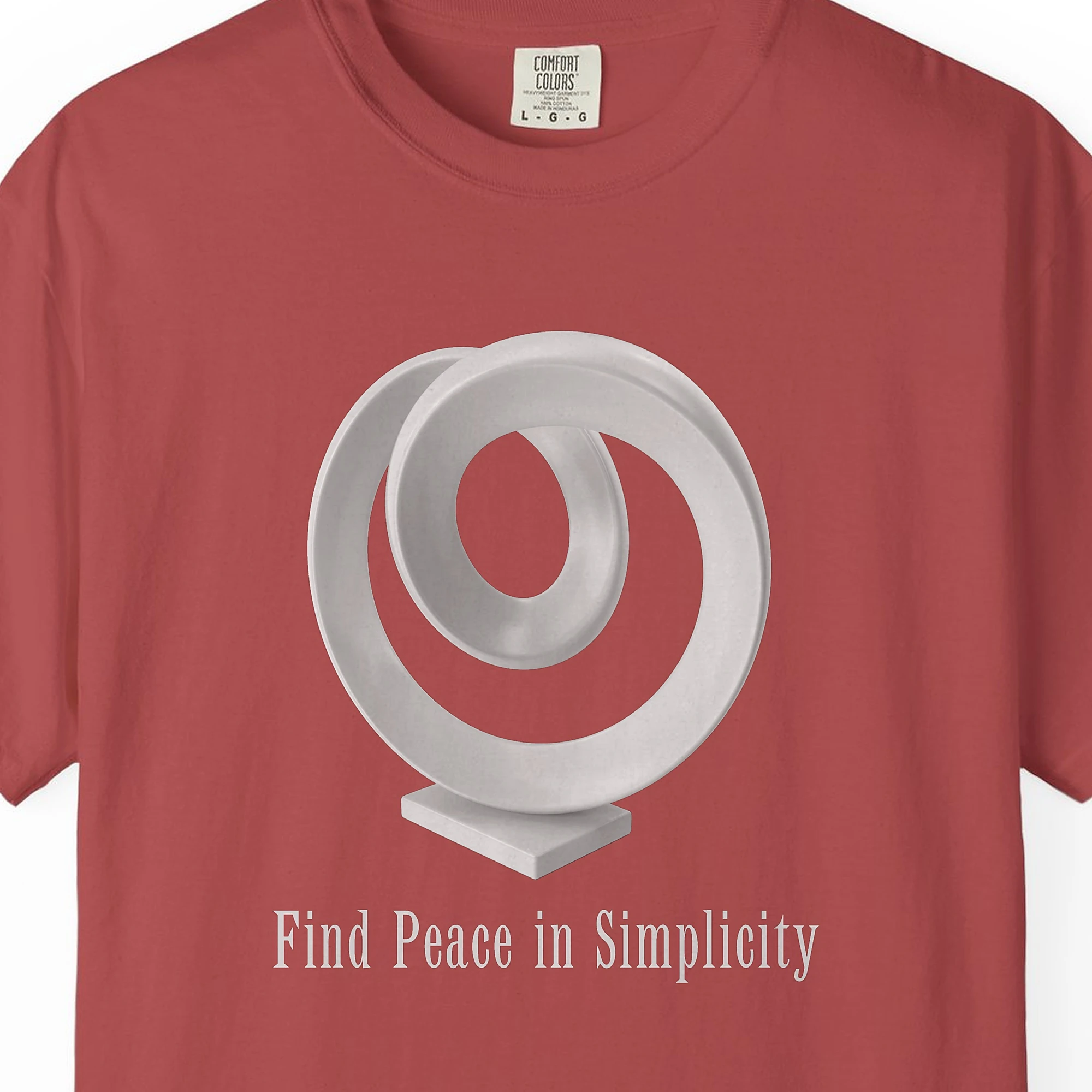 find-peace-in-simplicity-tee-crimson-chest Close-up of the Find Peace in Simplicity print on a Crimson Comfort Colors 1717 tee