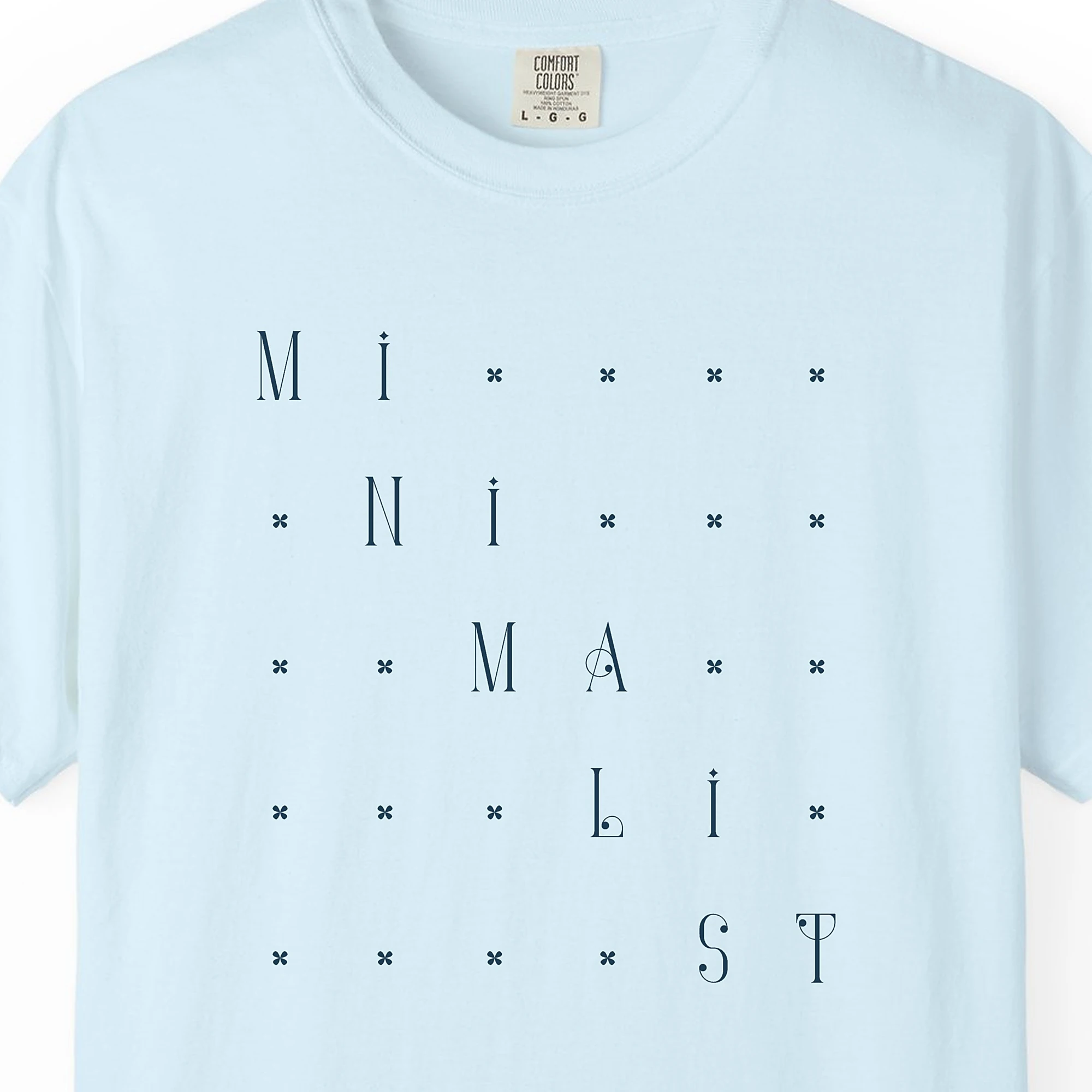 Close-up of the Fine Star Stairs print on a Chambray Comfort Colors 1717 tee