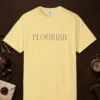 Flourish Tall Serif design on a Butter Comfort Colors 1717 tee, laid flat