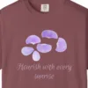 Close-up of the Flourish with Every Sunrise print on a Brick Comfort Colors 1717 tee