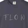 Close-up of the Flow Brush Capitals print on a Navy Comfort Colors 1717 tee