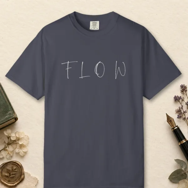 Flow Brush Capitals design on a Navy Comfort Colors 1717 tee, laid flat