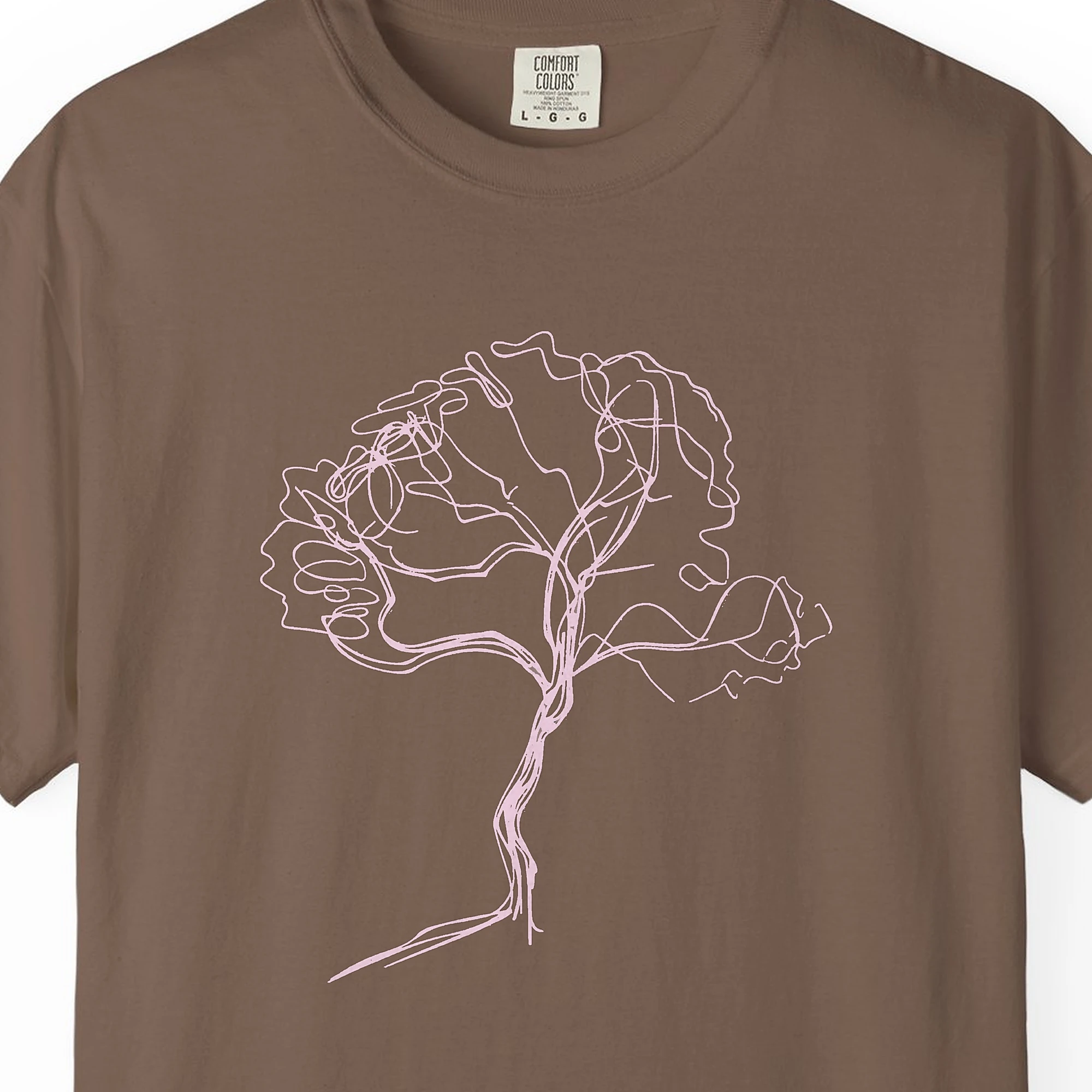 Close-up of the Flowing Line Tree print on a Espresso Comfort Colors 1717 tee