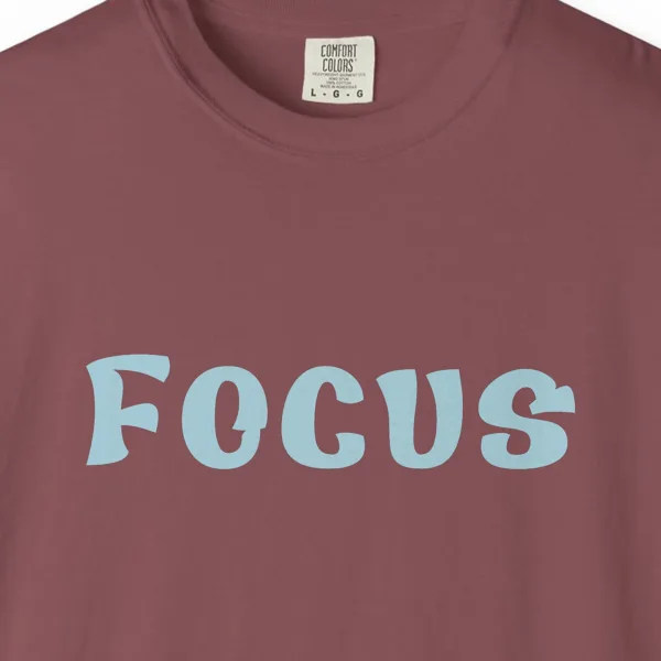 Close-up of the Focus print on a Brick Comfort Colors 1717 tee