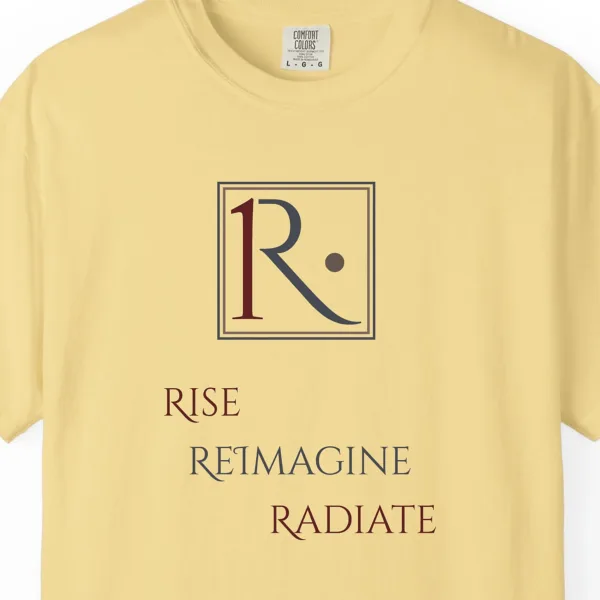 Close-up of the Framed R Monogram print on a Butter Comfort Colors 1717 tee