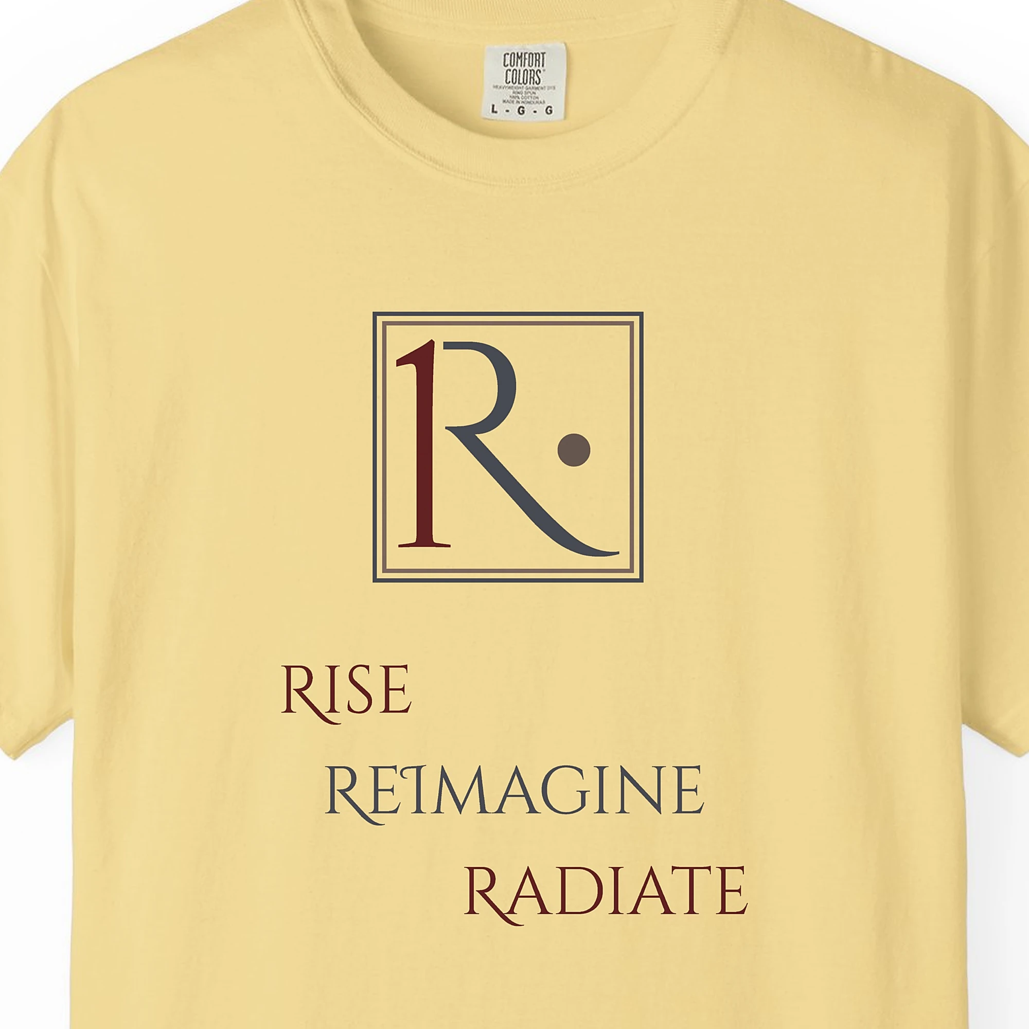 Close-up of the Framed R Monogram print on a Butter Comfort Colors 1717 tee