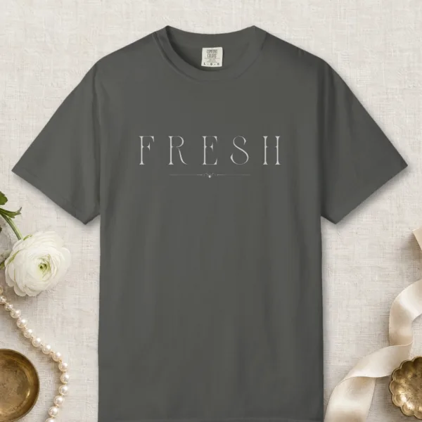 Fresh Serif Caps design on a Pepper Comfort Colors 1717 tee, laid flat