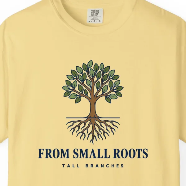 from-small-roots-tee-butter-chest Close-up of the From Small Roots print on a Butter Comfort Colors 1717 tee
