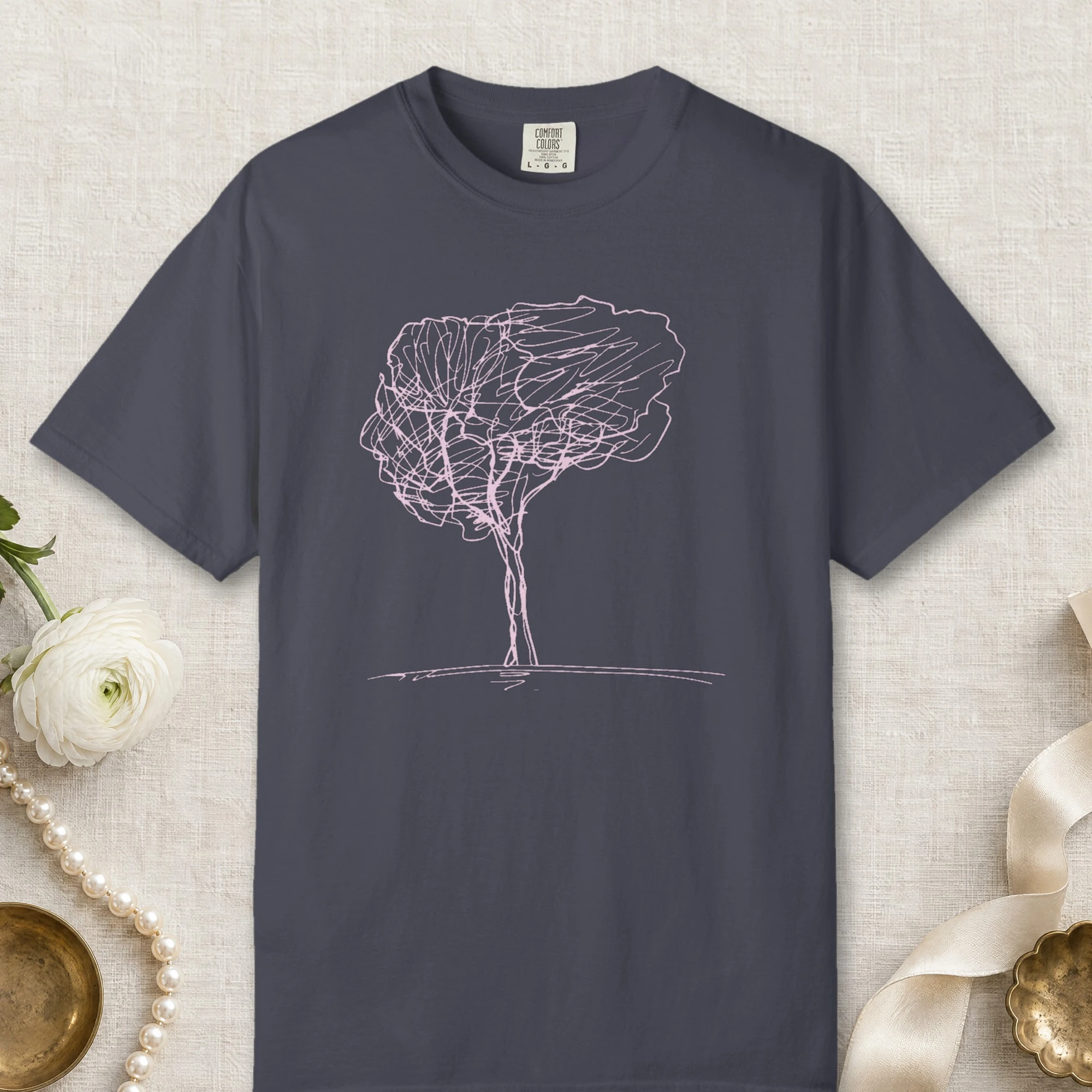 Full Crown Tree design on a Navy Comfort Colors 1717 tee, laid flat