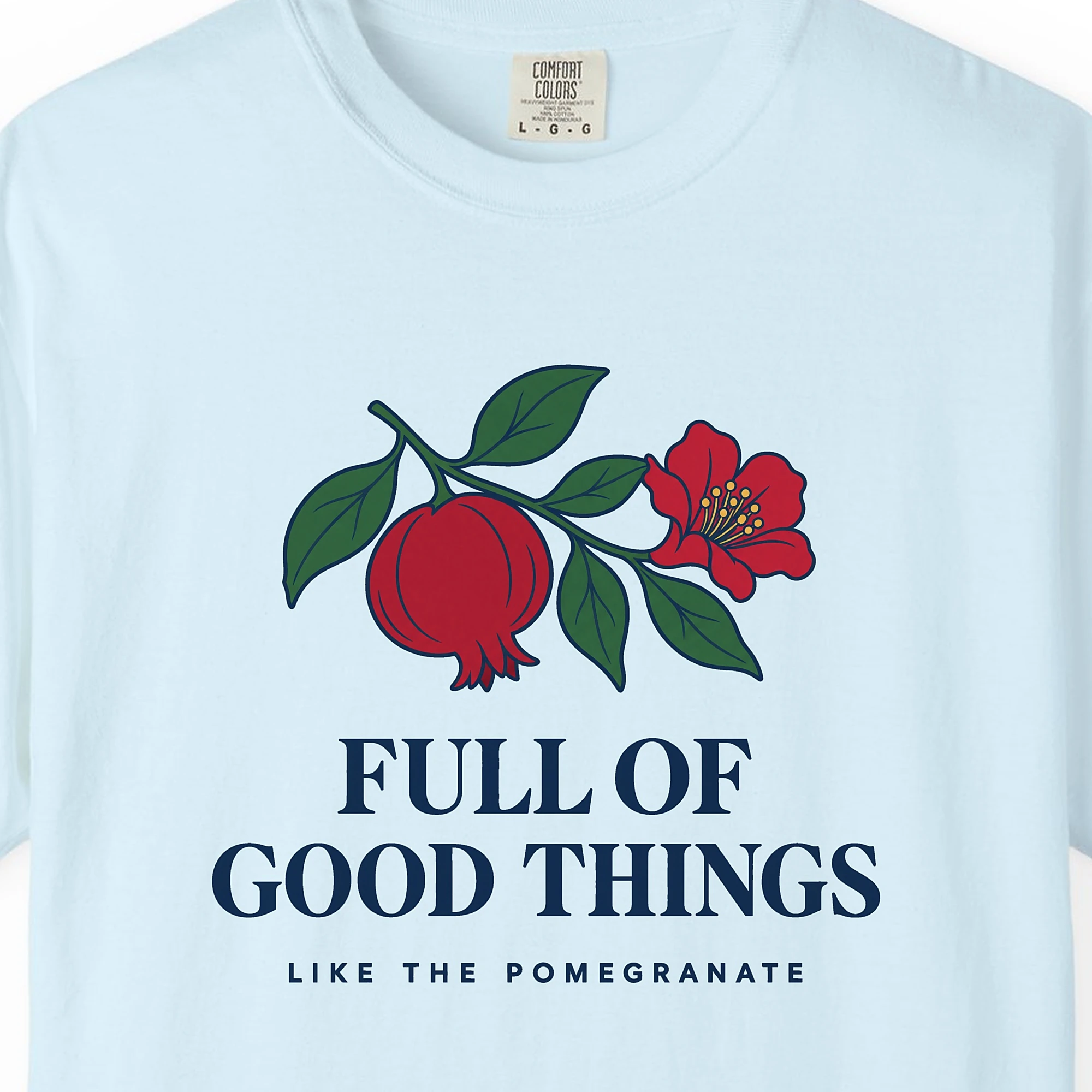 Close-up of the Full of Good Things print on a Chambray Comfort Colors 1717 tee