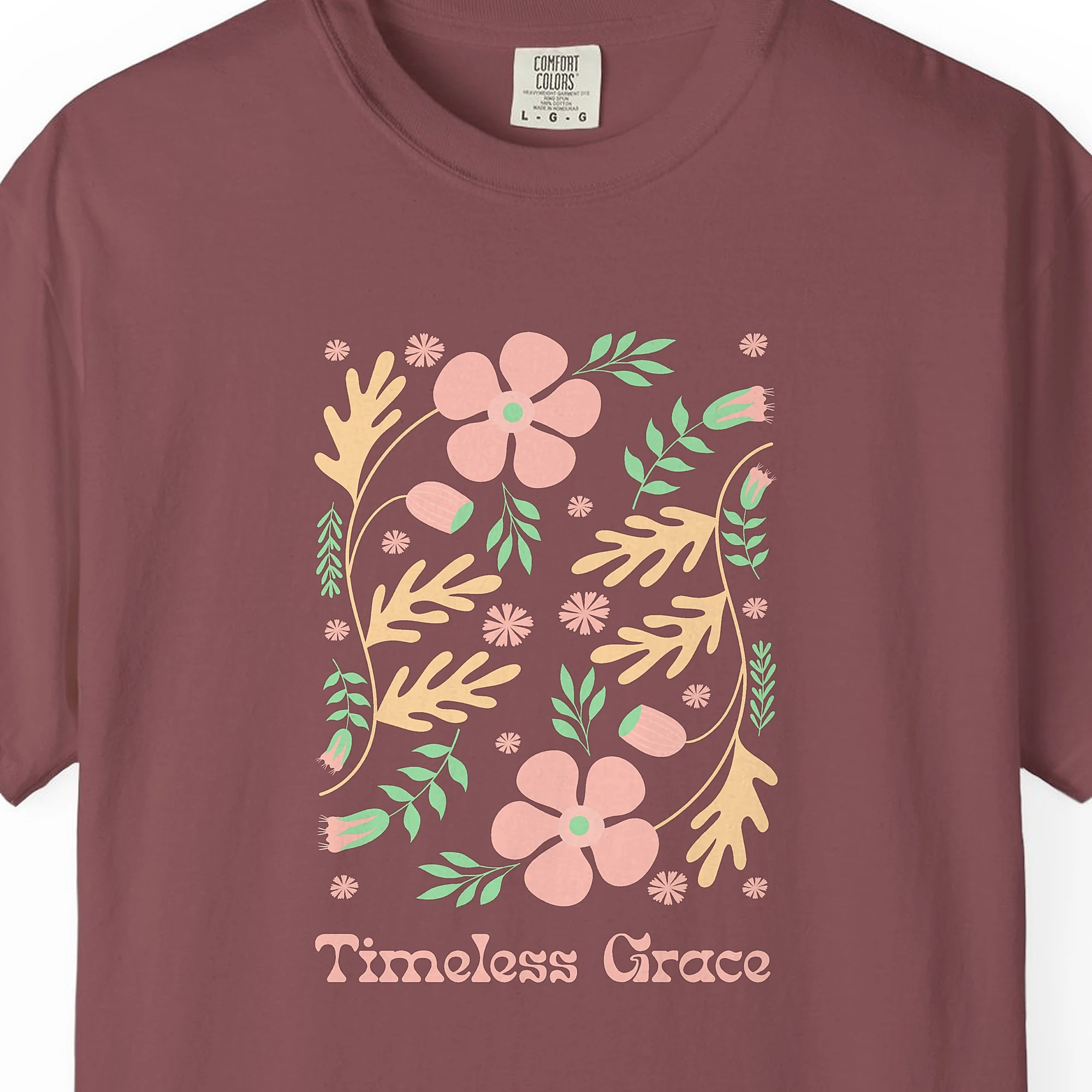 Close-up of the Garden of Grace print on a Brick Comfort Colors 1717 tee