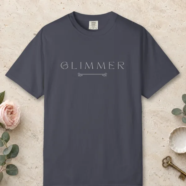 Glimmer Scroll design on a Navy Comfort Colors 1717 tee, laid flat