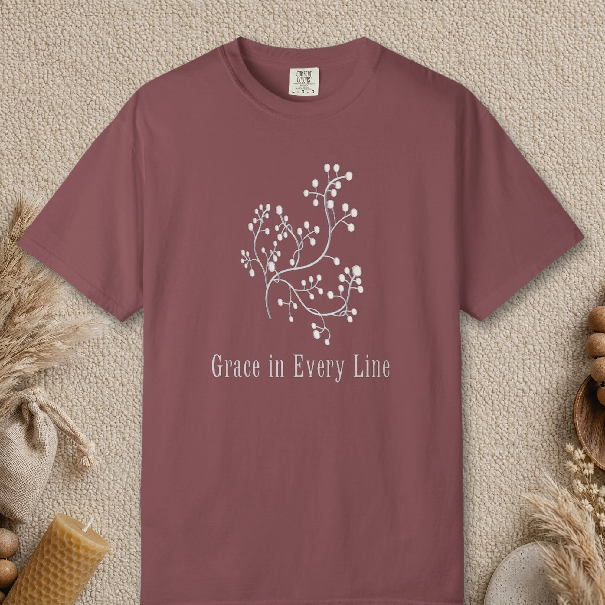 Grace in Every Line design on a Brick Comfort Colors 1717 tee, laid flat
