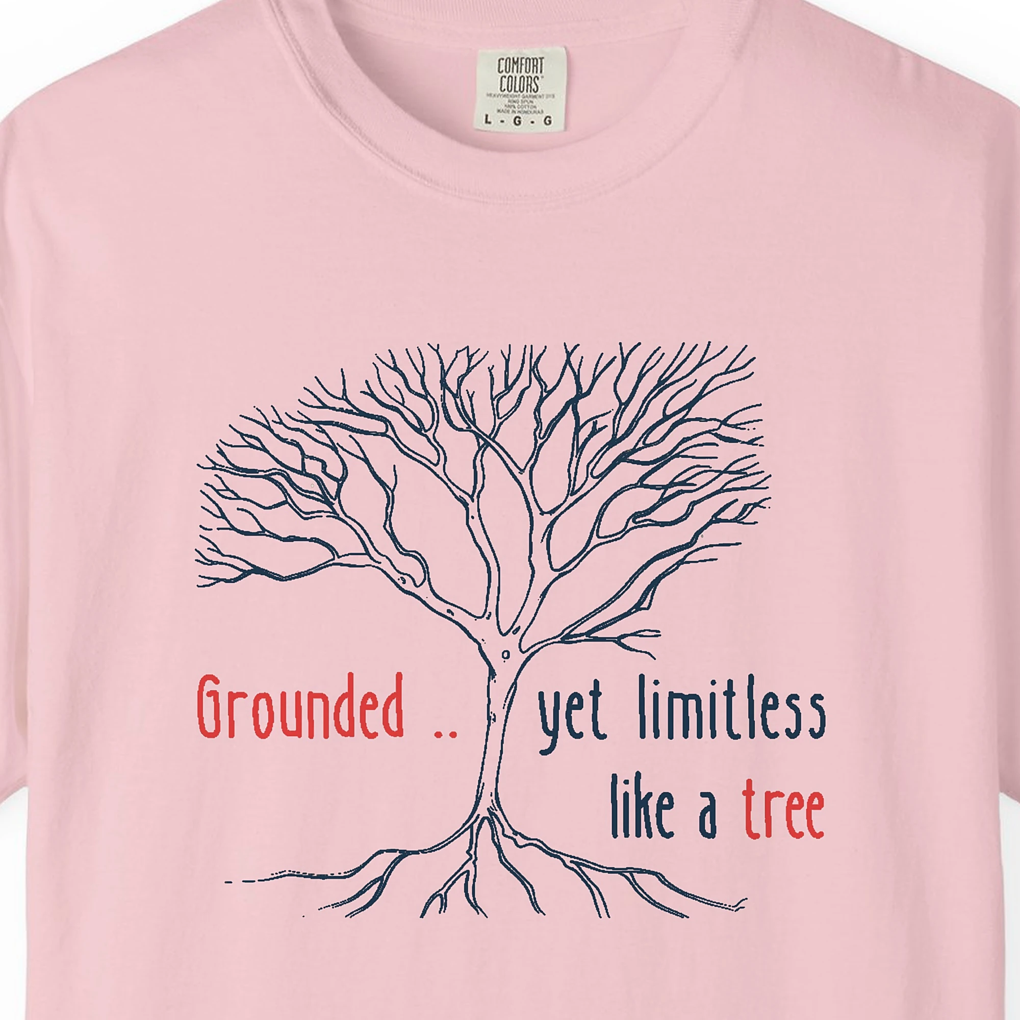 Close-up of the Grounded Yet Limitless print on a Blossom Comfort Colors 1717 tee