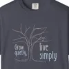 Close-up of the Grow Quietly Live Simply print on a Navy Comfort Colors 1717 tee