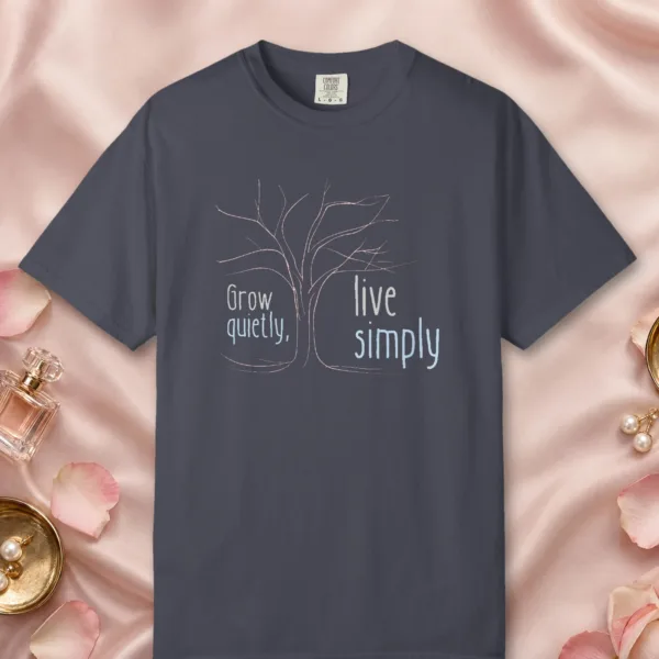 Grow Quietly Live Simply design on a Navy Comfort Colors 1717 tee, laid flat