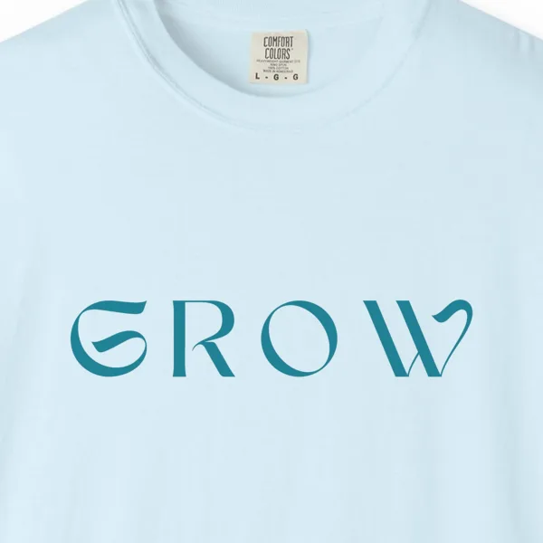 Close-up of the Grow print on a Chambray Comfort Colors 1717 tee
