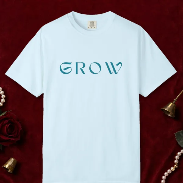 Grow design on a Chambray Comfort Colors 1717 tee, laid flat