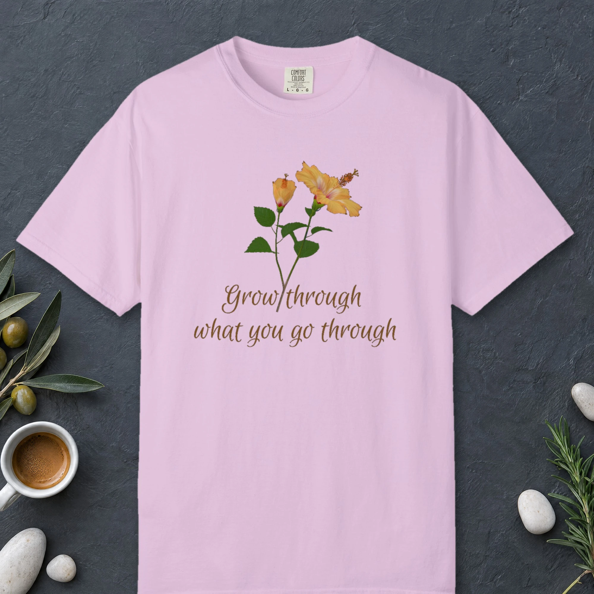 Grow Through It design on a Orchid Comfort Colors 1717 tee, laid flat