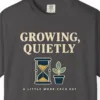 Close-up of the Growing Quietly print on a Graphite Comfort Colors 1717 tee