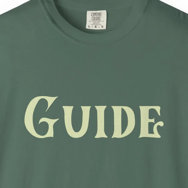 guide-tee-blue-spruce-chest Close-up of the Guide print on a Blue Spruce Comfort Colors 1717 tee