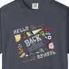 Close-up of the Hello School Supplies print on a Navy Comfort Colors 1717 tee