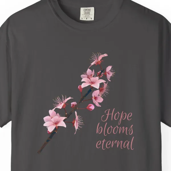 Close-up of the Hope Blooms Eternal print on a Graphite Comfort Colors 1717 tee