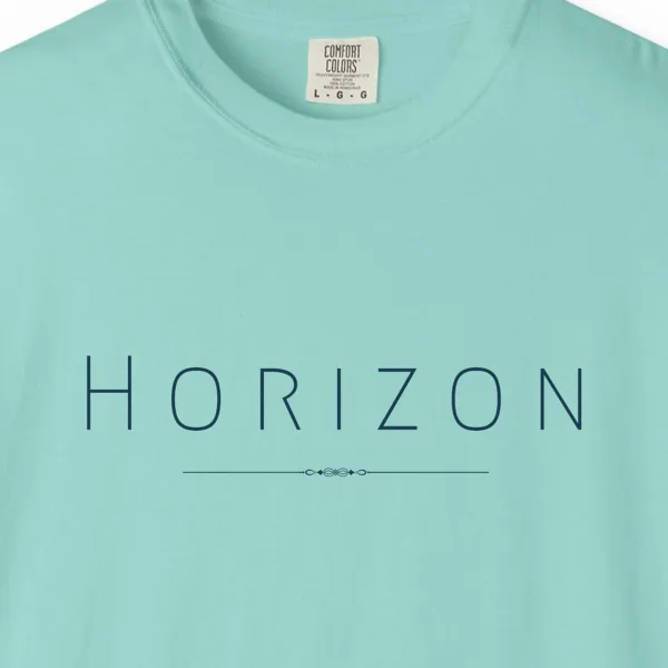 Close-up of the Horizon Line print on a Chalky Mint Comfort Colors 1717 tee