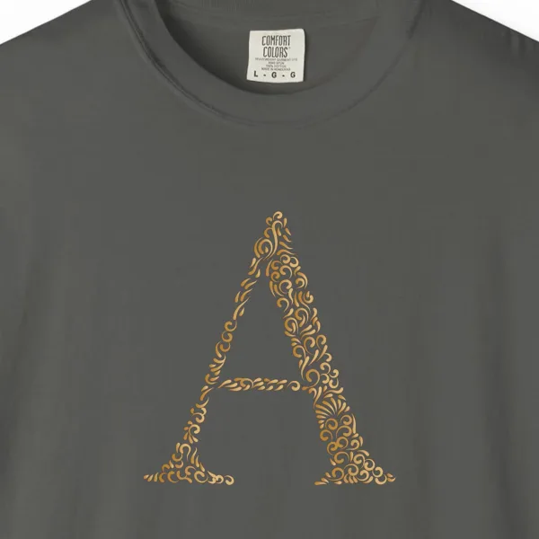initial-a-tee-pepper-chest Close-up of the Initial A print on a Pepper Comfort Colors 1717 tee