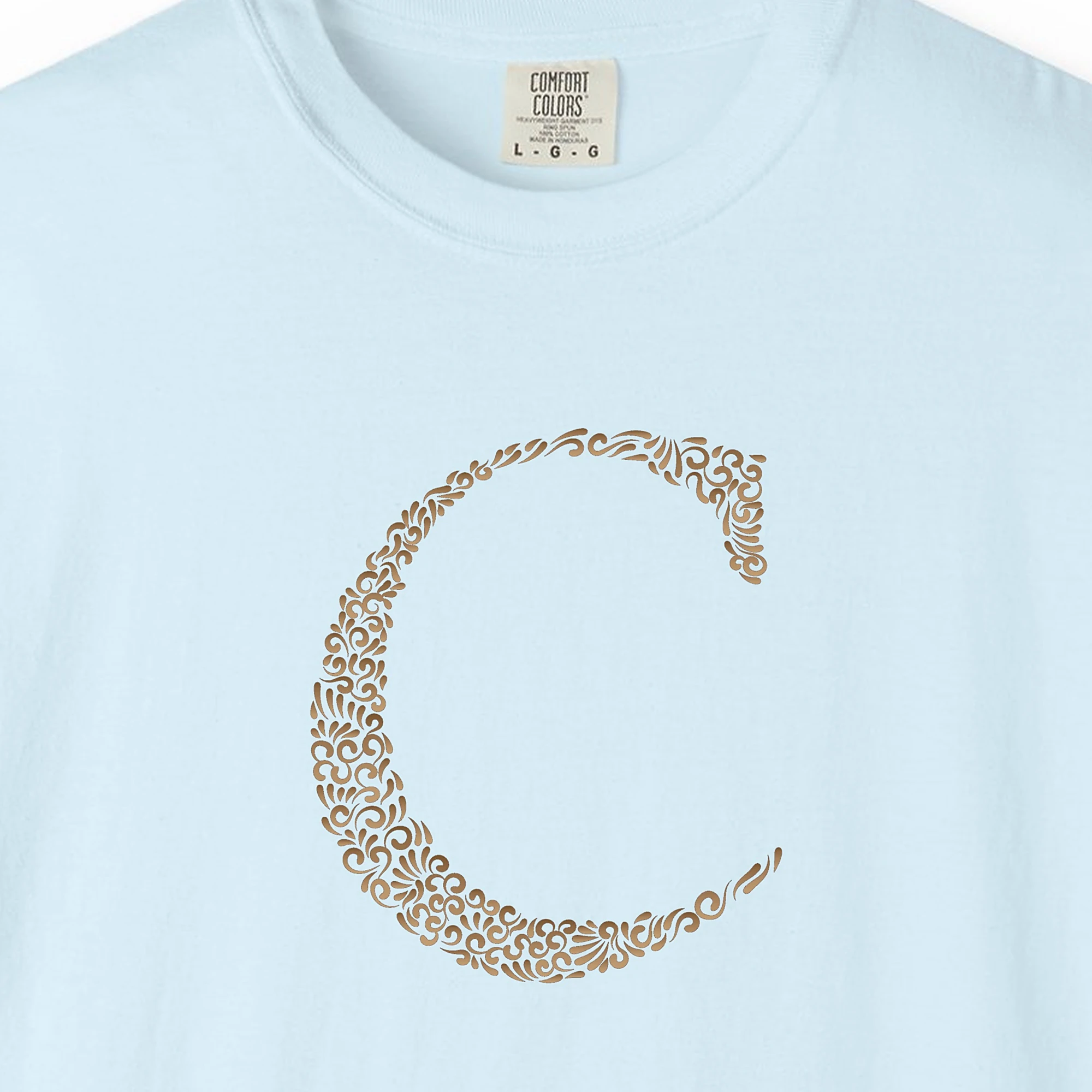 Close-up of the Initial C print on a Chambray Comfort Colors 1717 tee