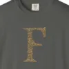 Close-up of the Initial F print on a Pepper Comfort Colors 1717 tee