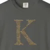 initial-k-tee-pepper-chest Close-up of the Initial K print on a Pepper Comfort Colors 1717 tee