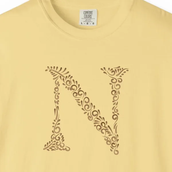 initial-n-tee-butter-chest Close-up of the Initial N print on a Butter Comfort Colors 1717 tee