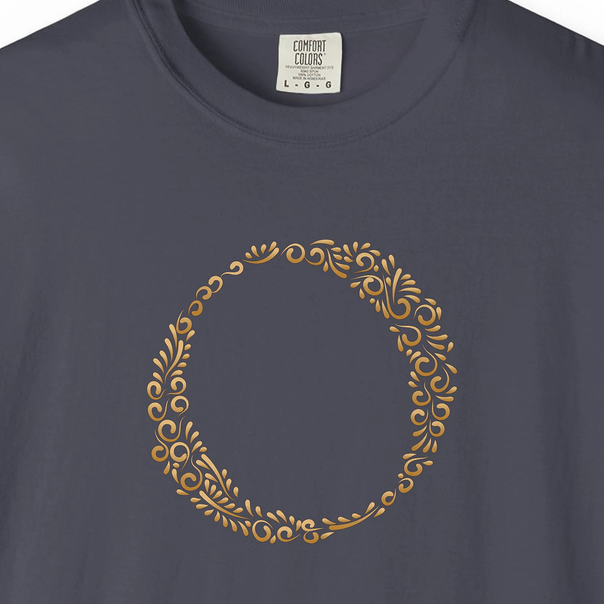 Close-up of the Initial O print on a Navy Comfort Colors 1717 tee