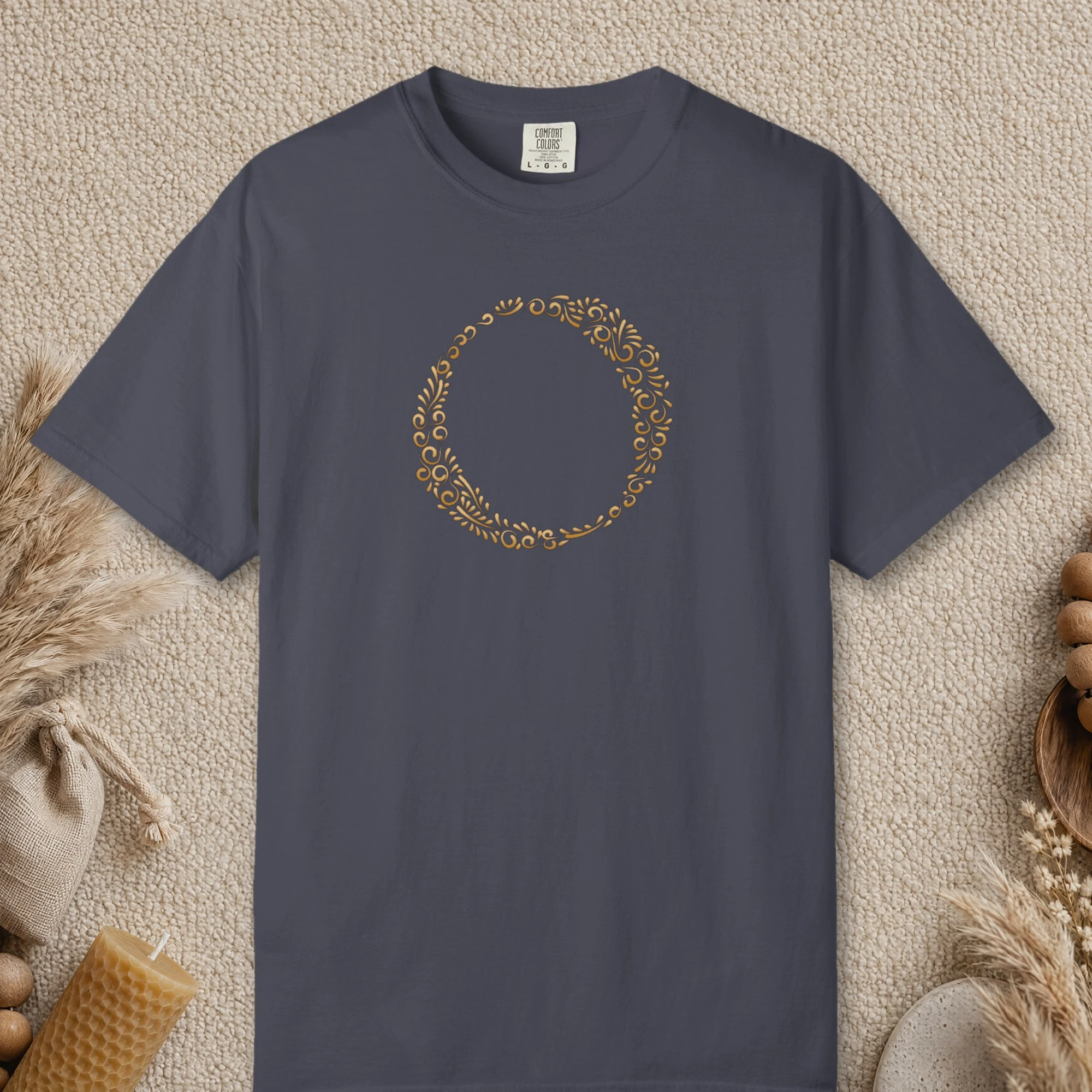 Initial O design on a Navy Comfort Colors 1717 tee, laid flat