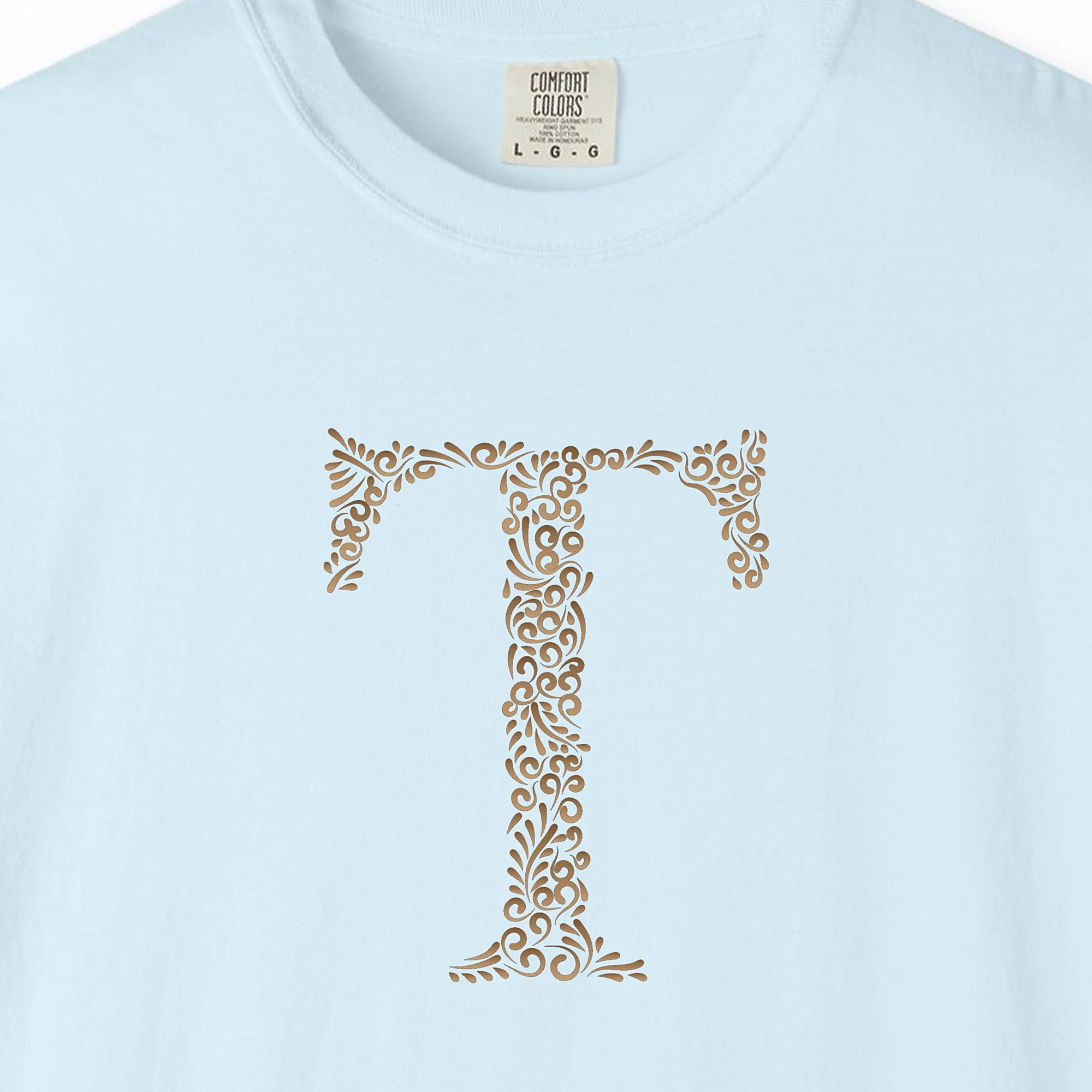 Close-up of the Initial T print on a Chambray Comfort Colors 1717 tee