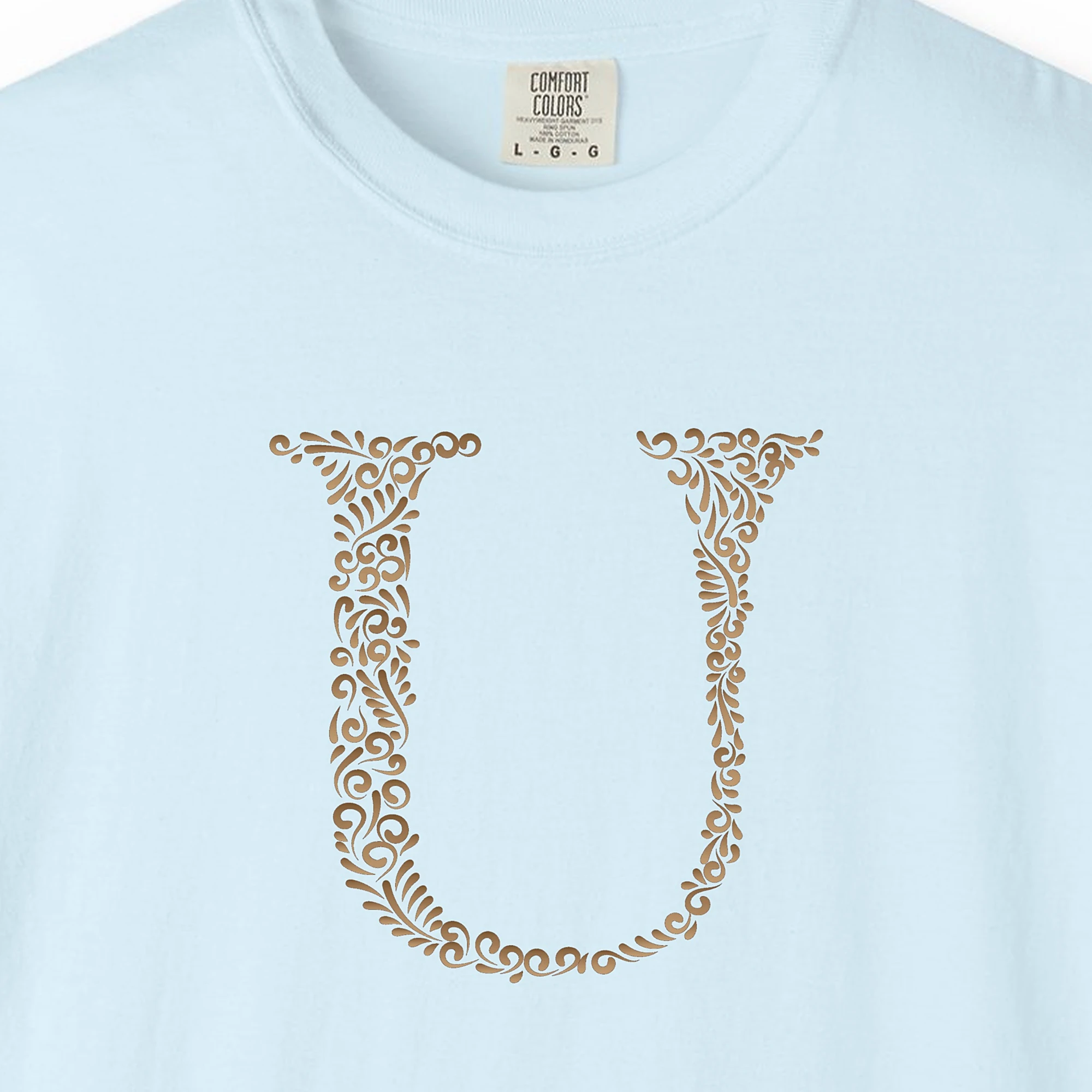 Close-up of the Initial U print on a Chambray Comfort Colors 1717 tee